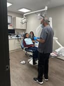 RESTORE Dental Specialists logo