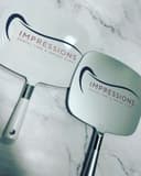 Impressions Dental Care logo