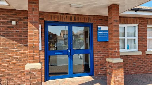 Coastwood Dental Care. logo