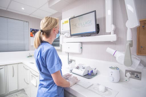 The Village Dental Surgery logo